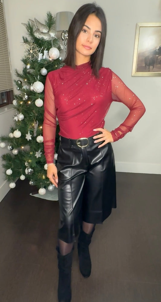 đ Top de Malla Brillante con Cuello Cisne